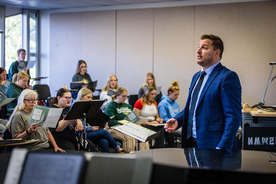 Dr. Adam Zrust conducts Northwest vocal ensembles and serves as an assistant professor of music. (Photo by Lauren Adams/Northwest Missouri State University)